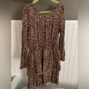 Girls long sleeve dress and cheetah print. In great condition.